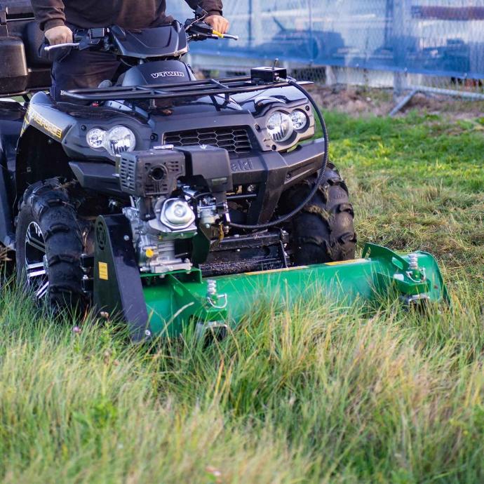 cutting long grass with a front mounted ATV mower